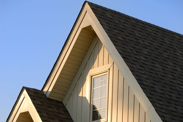 Close up of house roof and windows