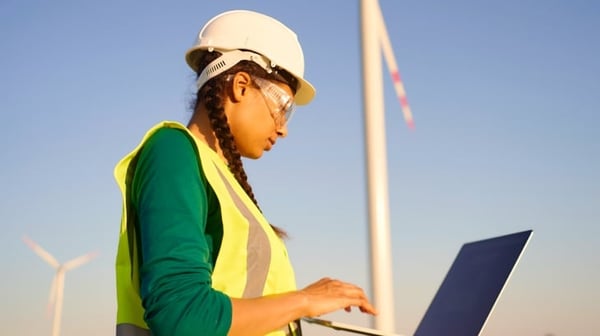 Woman working with electricity windmills