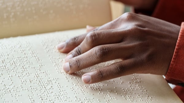 Person using Braille