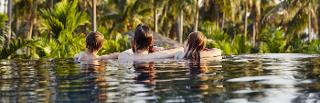 life cover - resources - img - Life insurance and moving abroad - family in swimming pool