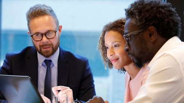 Close up of colleagues talking