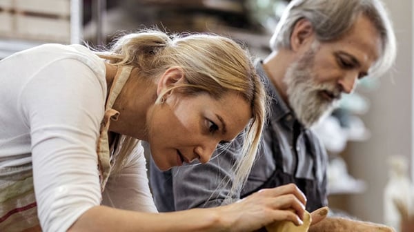 Man and women working