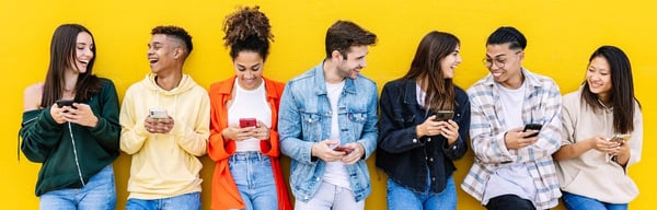Image showing adults using their mobile phones