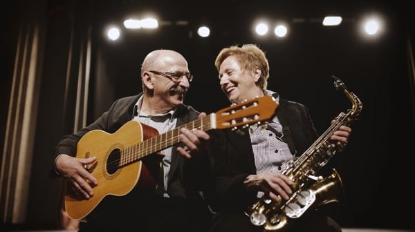 Couple enjoying playing music together