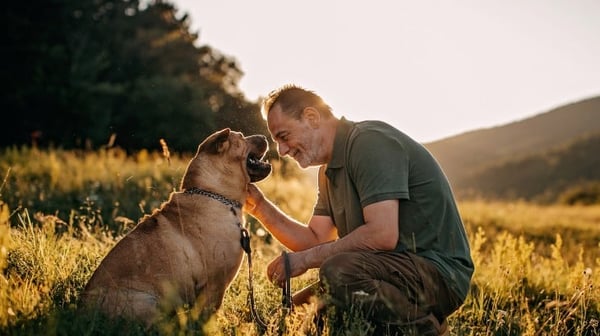 Senior man out with his dog