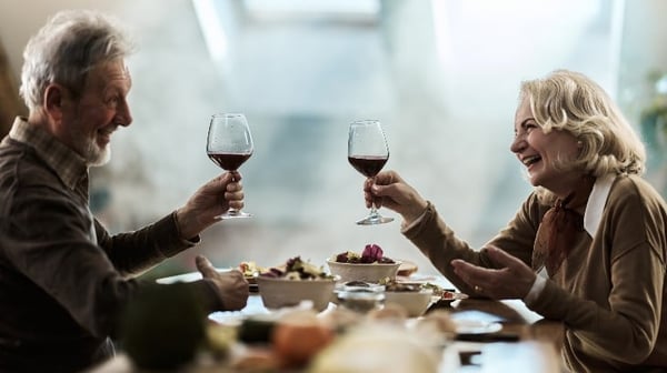image of a man and woman drinking wine on a date