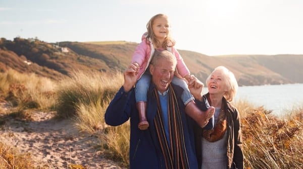 Grandfather and grandchild on shoulders