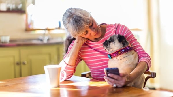 Mature lady hold her dog