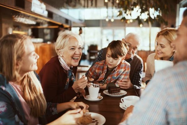 Multi generational family in café