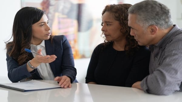 Senior couple discussing a will