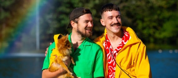 Two men with dog