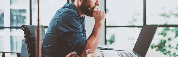 man working at laptop