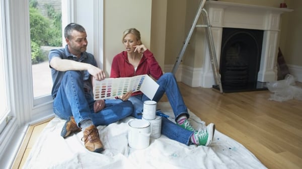 Couple choosing paint
