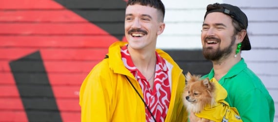 Two men with dog