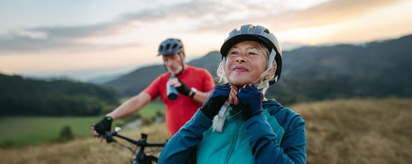 Older-couple-with-bike-helmets