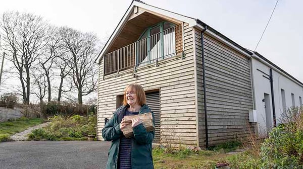 Lillian with her house