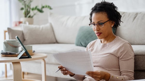 Woman looking at paperwork