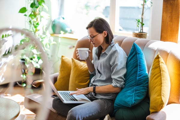 Woman writing a budget