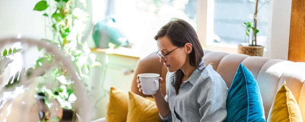 Woman writing a budget