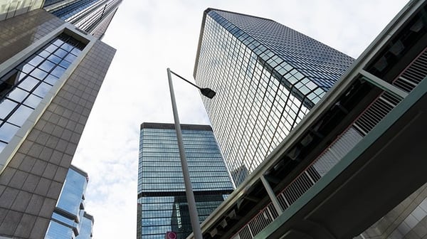 Looking up at tall office buildings