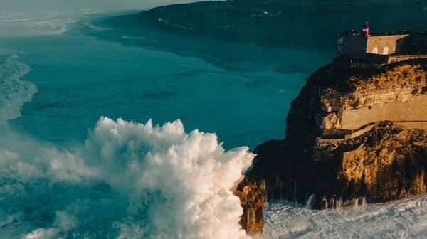 Waves crashing against rocky coastline
