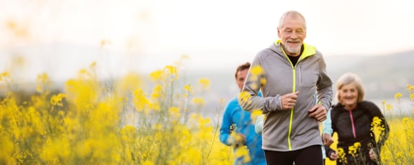 People running in a field