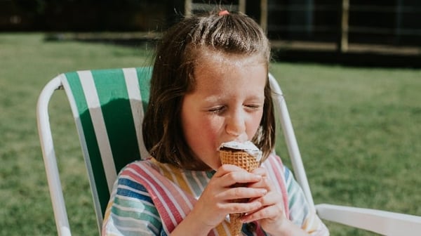 Little girl eating ice cream