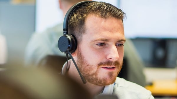 Man talking wearing a headset