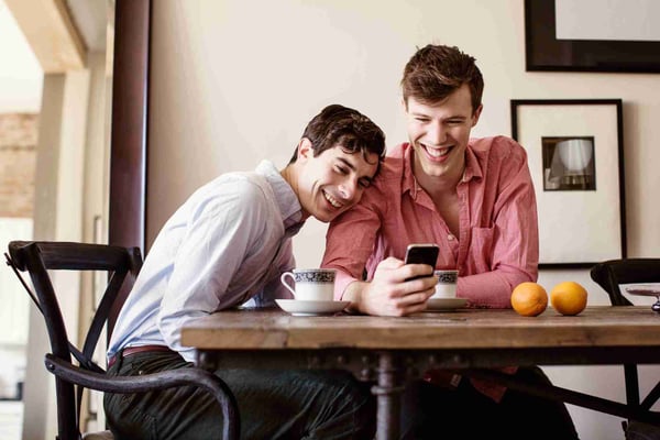 Two men laughing