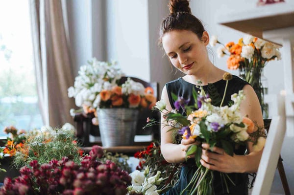 Woman with bunch of flowers