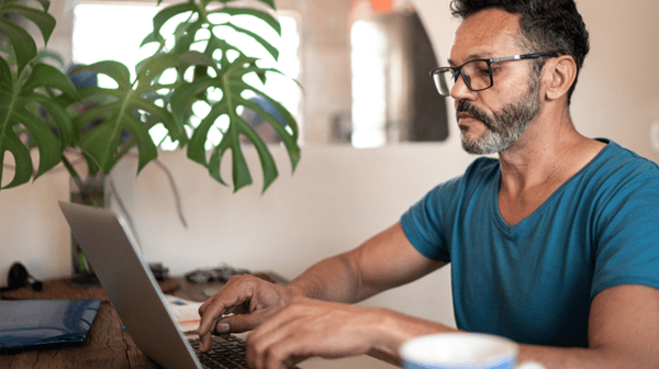 Man using a home laptop