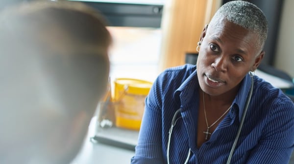 Doctor talking with a patient