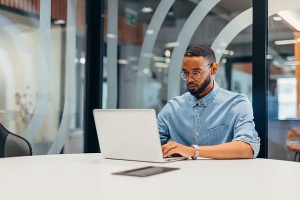 man working on laptop
