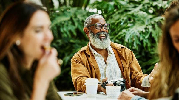 Man laughing in garden