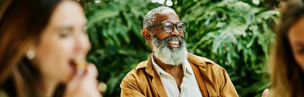 Man laughing in garden