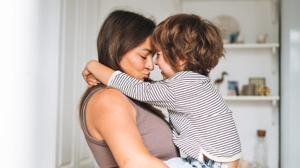 Image of mum and son hugging