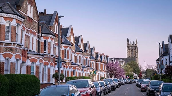 A row of houses near a cathedral