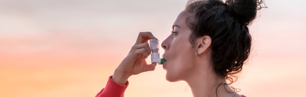 Image showing a woman with asthma inhaler