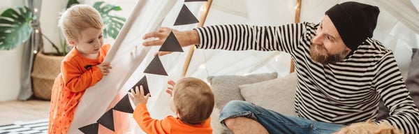Image showing a father playing with 2 young children