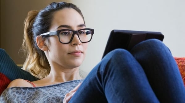 Woman looking at tablet