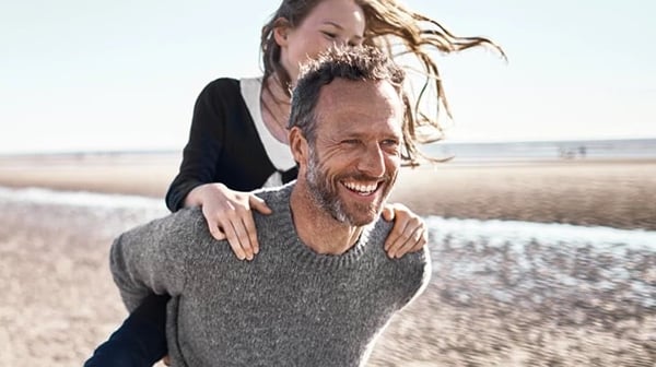 Man and boy on beach