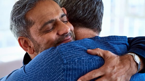 Men hugging