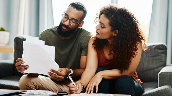 Couple looking at paper