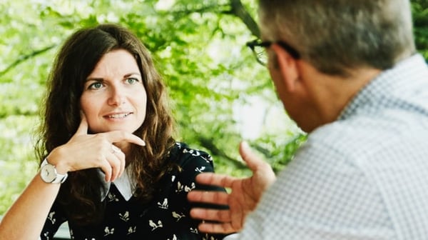 Man and woman in discussion