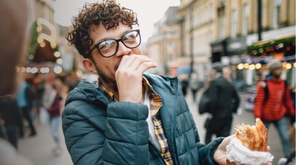 Man eating in the street