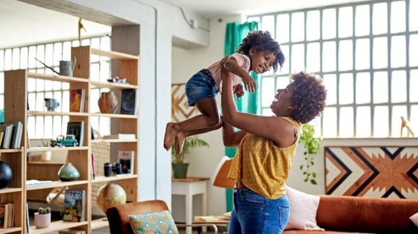 Image of a mum playing with young child