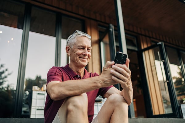 Man looking at mobile phone
