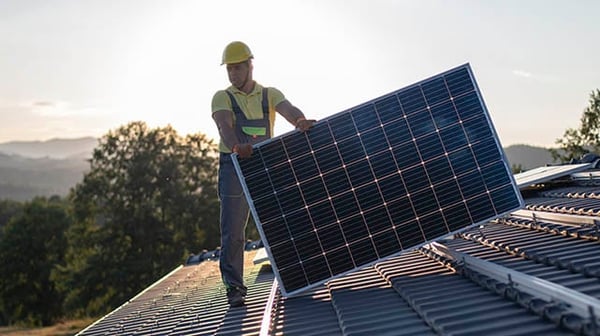 Man with solar panels