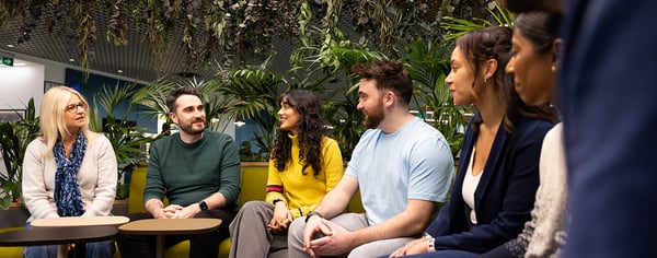 Colleagues sitting chatting