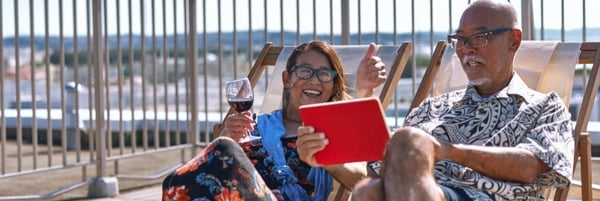 People on deck chairs